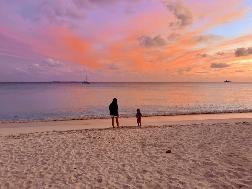 Family sunset walk at the beach in Anguilla