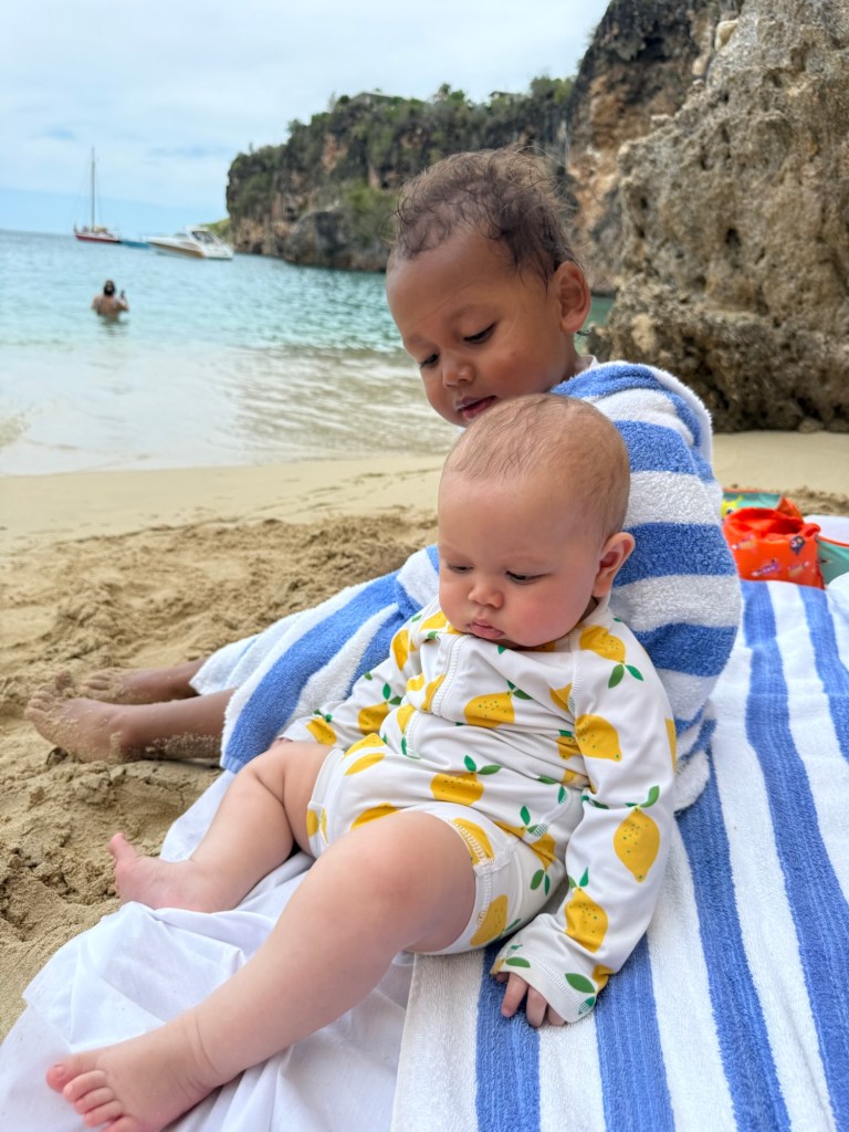 Toddler laughing at the beach in Anguilla