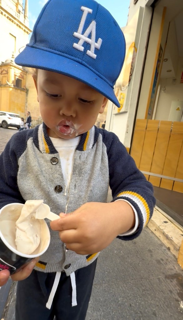 Paxton enjoying ice cream on the streets of Córdoba, Spain