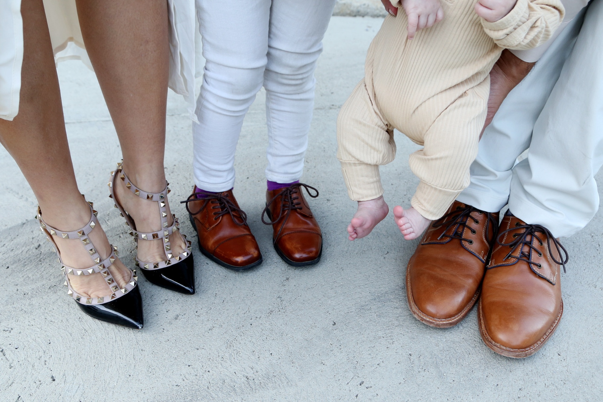 Family feet photo on porch