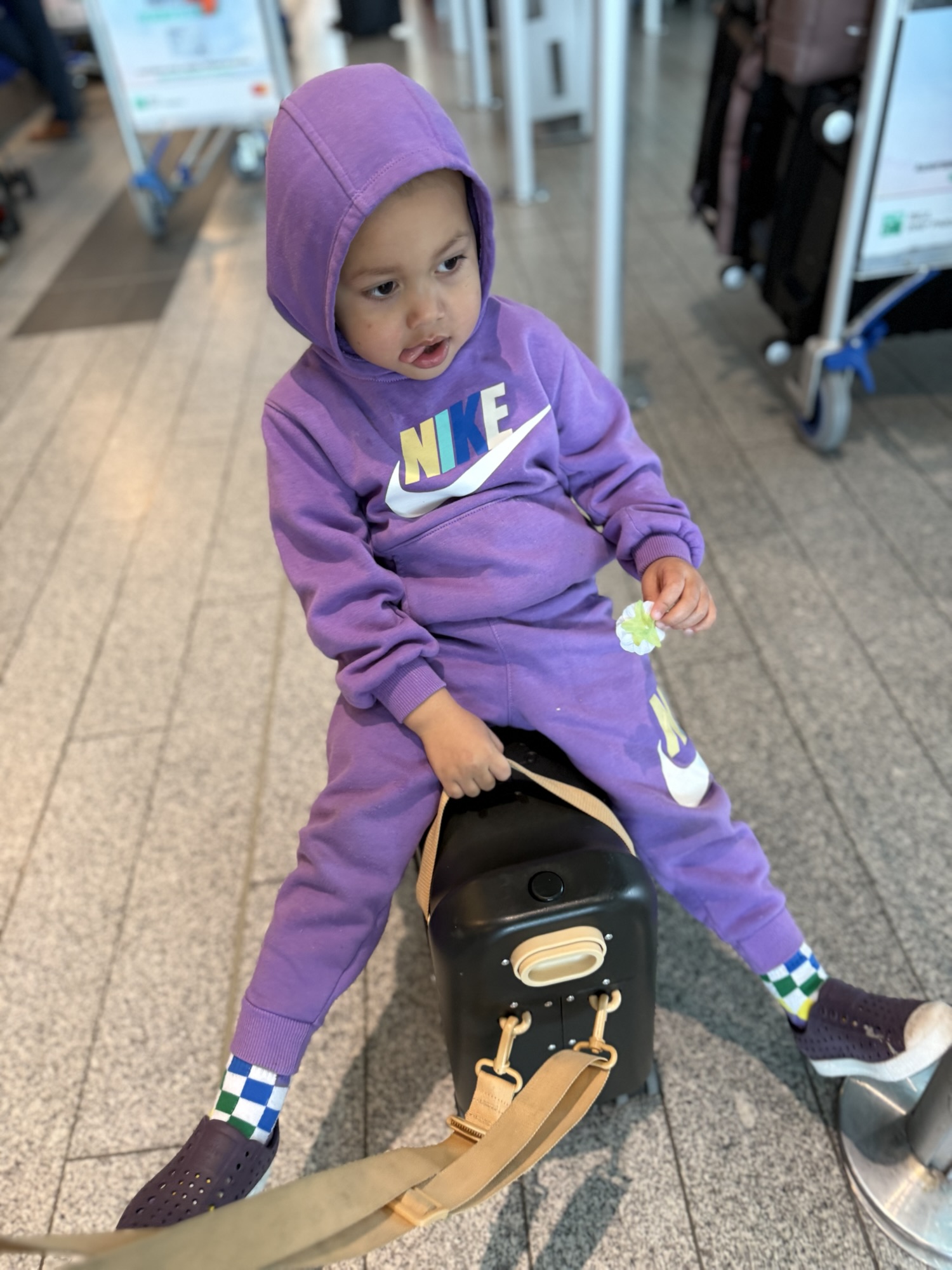 Toddler exploring cobblestone streets
