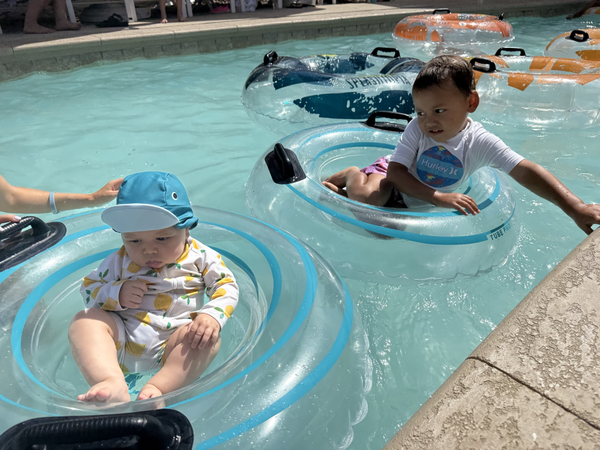 Paxton and Kai on lazy river at Splashtopia