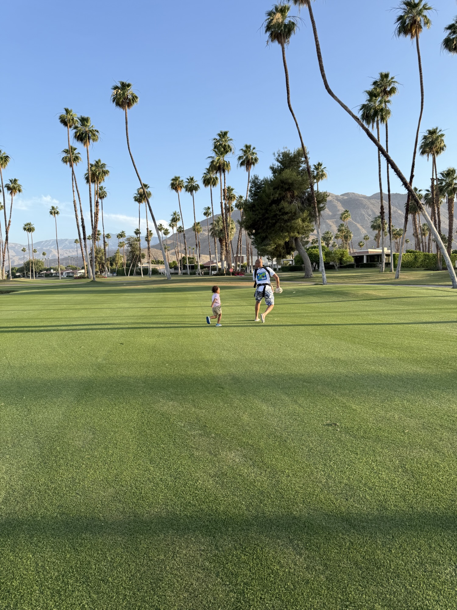Paxton running with Jan on Omni Rancho grounds