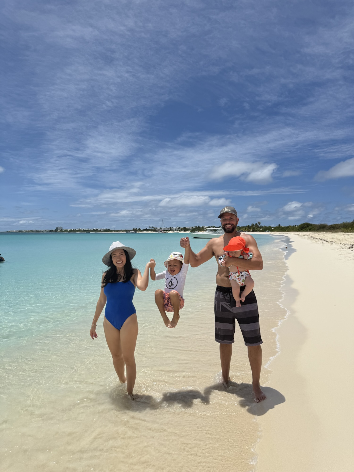 Our family walking along the shore at Rendezvous Bay, Anguilla