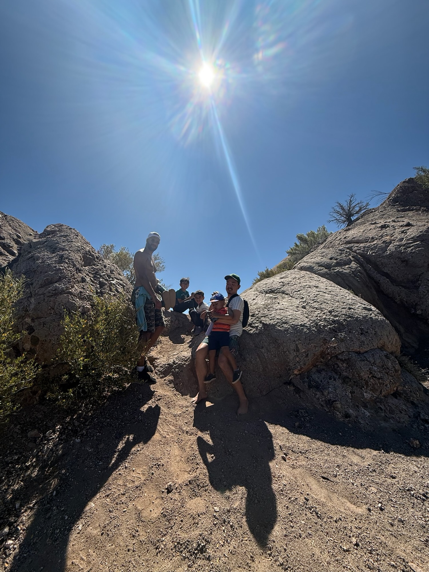 Family hiking together to the scenic overlook