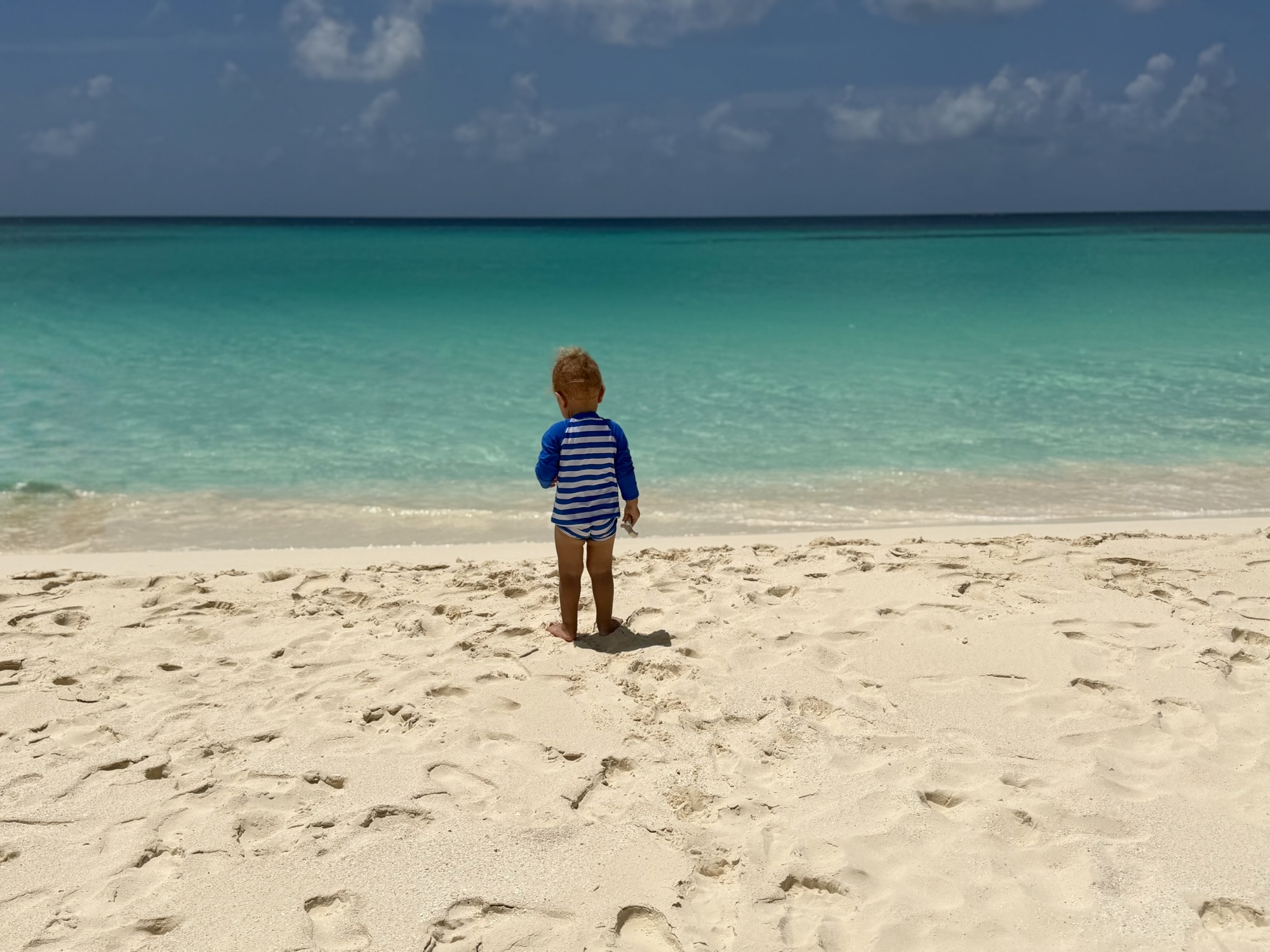 Kai looking out at the water near Prickly Pear, Anguilla